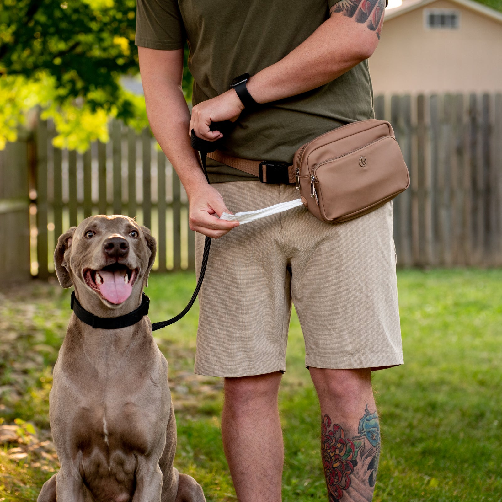 Puppington bag flat lay with poop bag in use